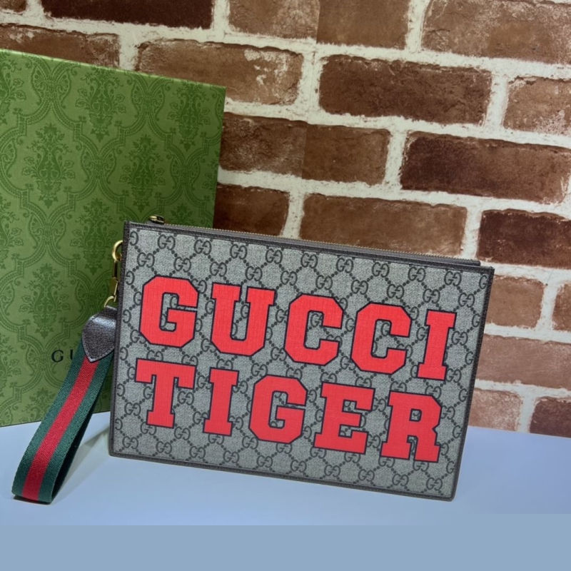 G*u*i clutch bags